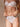 Signature White mid-rise silk thong with delicate French eyelash lace panel for a flattering, elegant silhouette.