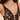 Close-up of black embroidered tulle plunging underwire cup with scalloped lace edge and sheer center panel