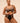 Model wearing Romance full plunge bra embroidered cups and plunging neckline