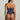 Lace V-string with minimal coverage and delicate embroidery, designed for a seductive, seamless silhouette and lightweight comfort.