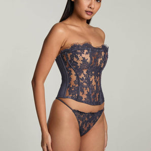 Lace V-string with minimal coverage and delicate embroidery, designed for a seductive, seamless silhouette and lightweight comfort.