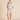 Short silk pajama set in strawberry print with elastic waist shorts and branded buttons, offering breezy fit and charming luxury.