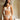 model wearing the Sublime Organza thong in white by Lise Charmel with embroidered organza front and lace sides