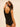 back view of the Subtile forming bodysuit in black by Simone Pérèle showing smoothing effect and boyshort cut