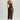 Woman wearing Tokyo Evenings black lace skirt with matching bralette