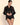 Model wearing the Lise Charmel Variations Désir silk sheer blouse