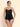 Model wearing Variations Désir Camisole in black by Lise Charmel in silk voile with thin straps  