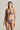 model wearing the Venetian Glass thong in blue with intricate embroidered lace
