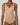 Close-up of rose tan forming bodysuit showing molded bust and V-neckline