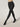 Model wearing Wolford Cotton Dot Tights in black showing all-over dot pattern and smooth matt finish