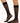 Model wearing Wolford Individual 10 Knee-Highs in black showing matte sheer finish and comfort band