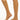 Model wearing Wolford Individual 10 Knee-Highs in nude showing matte sheer finish and comfort band