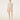 Wolford Infinite Rose Net String Body in cream, featuring a seamless sleeveless round neckline, sheer floral warp knit net, thong back, and cotton gusset with snap closure.
