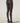 Back view of model wearing Mermaid Tights by Wolford with geometric scale pattern