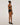 Back view of the Wolford Pure 3W Skin Bra in black showcasing adjustable bonded straps, a flat closure, and a smooth seamless design.