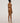 Back view of the Wolford Pure String in Fairly Light showcasing a seamless thong silhouette with a smooth invisible finish.