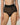 A model wearing high-waisted sheer black mesh briefs with a solid black waistband, shown from the waist down against a light beige studio background.