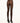 Model wearing Wolford Velvet De Luxe 66 Tights in soft cocoa showing smooth coverage and logo waistband