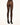 Model wearing Wolford Velvet De Luxe 66 Tights in soft cocoa showing smooth coverage and logo waistband