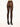 Model wearing Wolford Velvet De Luxe 66 Tights in soft cocoa showing smooth coverage and logo waistband