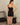Aspen Dream black ribbed camisole with built-in shelf bra and adjustable straps, made from soft bamboo for comfort and support.