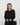 Aspen Dream black ribbed long sleeve top with relaxed fit and side slits in breathable, ultra-soft bamboo fabric.