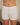 Aspen Dream ivory ribbed shorts with golden buttons and a pull-on waistband in breathable bamboo for stylish, everyday comfort.