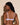 Forte lavender wireless bralette with French floral lace, plunge neckline, scalloped edges, and soft triangle cups for a bold, feminine look.