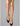 Model wearing Wolford Pure Energy 30 Leg Vitalizer Knee-Highs in gobi showing semi-transparent gloss and soft comfort band